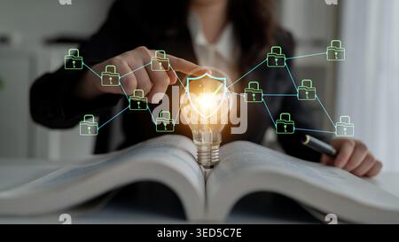 Business Professional Demonstrating Innovative Technology Concept with Light Bulb and Digital Security Connections in Modern Workspace Haptic. Stock Photo