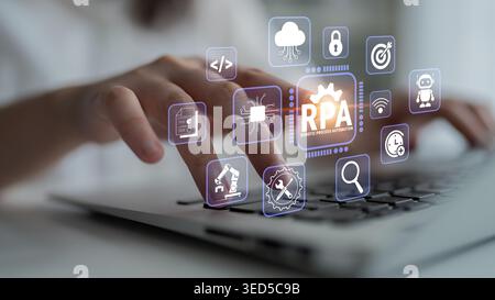 Human Hand Interacting with Laptop Showing Robotic Process Automation Icons and Symbols on Screen, Representing Technology and Innovation in Digital Stock Photo