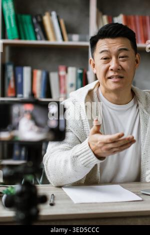 Man Recording Online Content Stock Photo