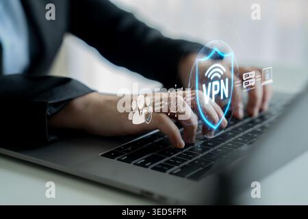 Businessperson using laptop with virtual VPN service interface for internet security and privacy protection in modern work environment Sigmoid Stock Photo