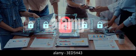 Professionals engage in collaborative discussions while exploring digital security solutions, highlighting the significance of data protection and Stock Photo
