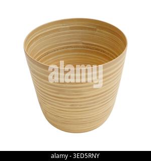 Empty bamboo pot isolated on white background. Round wooden container for houseplant. Eco friendly organic garden decor for home interior. Natural tex Stock Photo