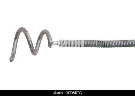Metal spiral drain snake cleaning tool for plumbing repair. Flexible wire auger with coiled tip for unclogging pipe. Manual maintenance equipment for Stock Photo