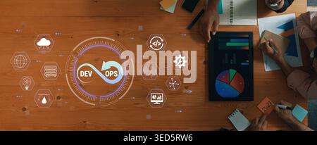 Collaborative workspace with DevOps icons, charts, and data analysis in a professional business environment focused on technology and teamwork Quark. Stock Photo