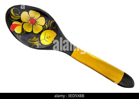 Black and golden painted wooden decorative spoon isolated over white Stock Photo