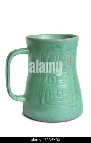 Large green craft ceramic mug isolated on white background Stock Photo