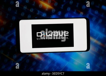 April 13, 2026, Germany: In this photo illustration, the logo of US technology company D-Wave Quantum Inc. is displayed on a smartphone in front of abstract background on computer screen. (Credit Image: © Timon Schneider/SOPA Images via ZUMA Press Wire) EDITORIAL USAGE ONLY! Not for Commercial USAGE! Stock Photo