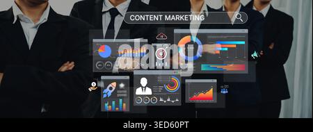 Diverse business team engaged in content marketing analysis with various data visualizations and digital tools, showcasing a dynamic and strategic Stock Photo