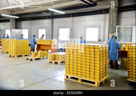 Kiev, Ukraine - August 31, 2010: Workers in warehouse preparing goods for dispatch. In Ukraine is very well developed logistics business Stock Photo