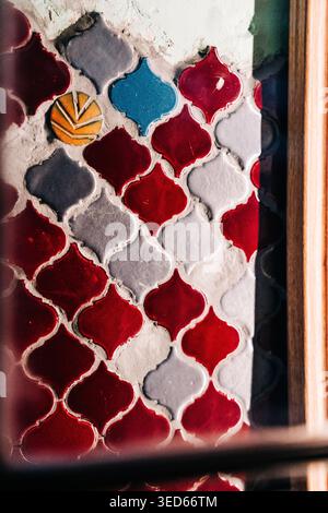 Arabesque ceramic wall tiles creating a decorative pattern Stock Photo