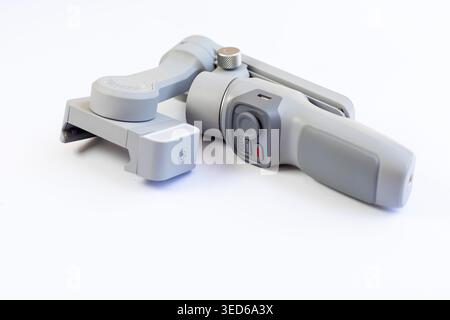 New Smartphone Gimbal Stabilizer Tool Isolated on White Background Stock Photo