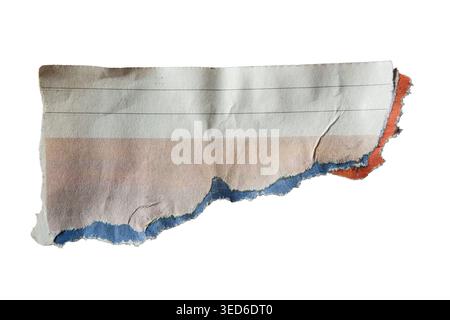 Torn Newspaper Scrap with Lined Patterns and Ripped Colorful Edges isolated on white background with clipping path Stock Photo