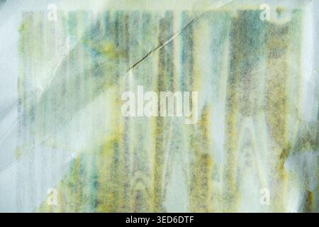 Abstract Distressed Paper Texture with Cyan and Yellow Ink Glitch Patterns Stock Photo