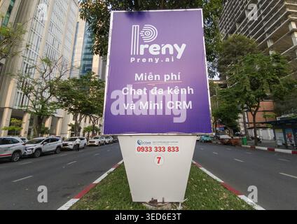 Outdoor ad for Preny platform offering AI-powered solutions for business management free multi-channel chat and Mini CRM services. Ho Chi Minh City Stock Photo