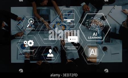 A dynamic business team collaborates in a modern workspace, exploring AI technology, automation, deep learning, and data analysis to drive innovation Stock Photo