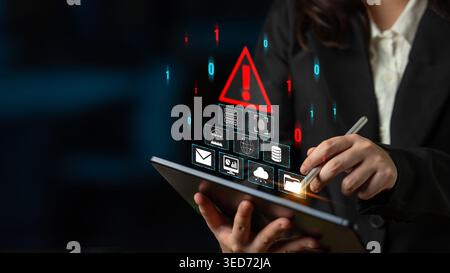 Businessperson Using Tablet to Manage Data Security with Warning Symbols and Digital Icons Representing Cyber Threats and Information Protection Stock Photo