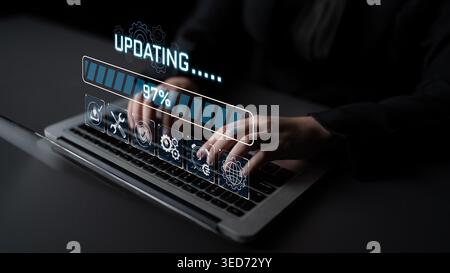 Modern Business Technology Update Progress on Laptop with Hands Typing and Graphic User Interface Elements Visible Sigmoid Stock Photo