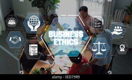 Business Ethics in the Workplace with Diverse Team Collaborating on Ideas and Strategies for Ethical Decision Making and Corporate Responsibility Stock Photo