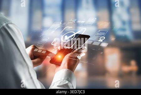 Modern Smartphone in User Hands Displaying Digital Interface with Security Checkmarks, Cloud Technology and Innovative Design Elements in Vibrant Stock Photo