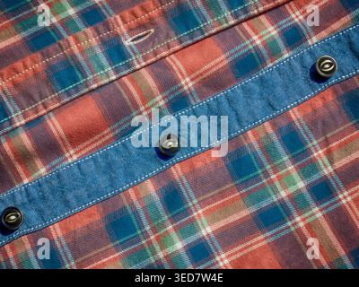 Blue-red check, cuffs, button, textile background Stock Photo