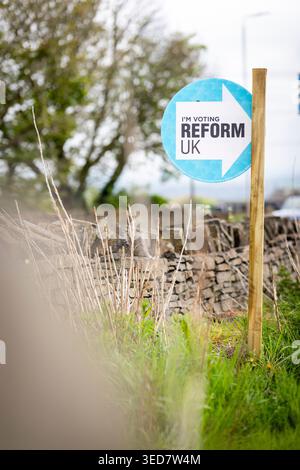 A Reform Party roadside call to vote in a field near Northowram,Halifax, West Yorkshire ahead of Thursdays May 7th 2026 council elections. Stock Photo