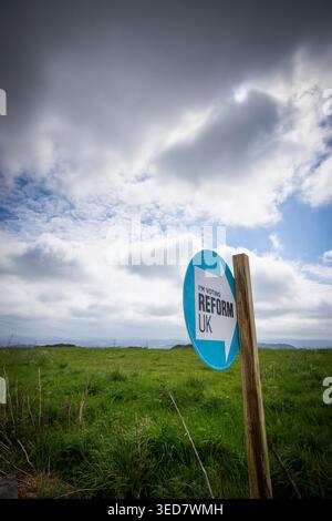 A Reform Party roadside call to vote in a field near Northowram,Halifax, West Yorkshire ahead of Thursdays May 7th 2026 council elections. Stock Photo