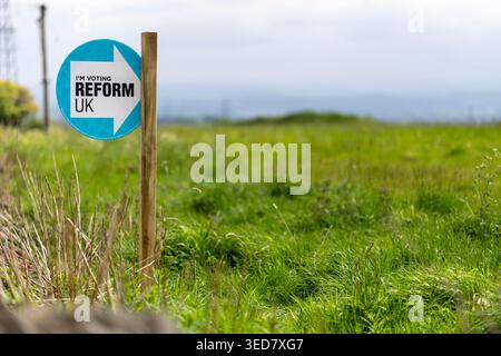 A Reform Party roadside call to vote in a field near Northowram,Halifax, West Yorkshire ahead of Thursdays May 7th 2026 council elections. Stock Photo