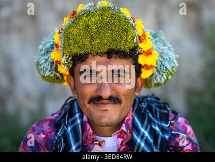 Saudi Arabia, Jizan province, Addayer, Portrait of a flower man wearing a floral crown on the head Stock Photo