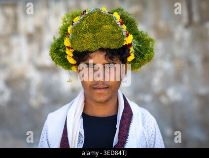 Saudi Arabia, Jizan province, Addayer, Portrait of a flower man wearing a floral crown on the head Stock Photo