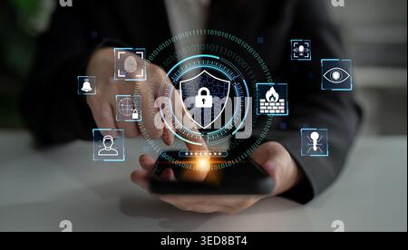 Modern Digital Security Concept with Cyber Protection Icons Displayed on Smartphone in Business Environment with Binary Code Background Quark. Stock Photo