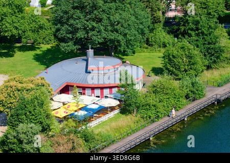 Germany, Baden Wurtemberg, Kehl, the garden of Two Rivers, Rheinschnecke bar restaurant, Old Rhine or Altrhein arm Stock Photo