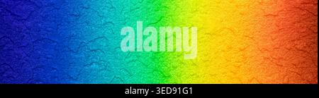 Real abstract rainbow colored textured wall background with bright spectrum gradient panorama Stock Photo