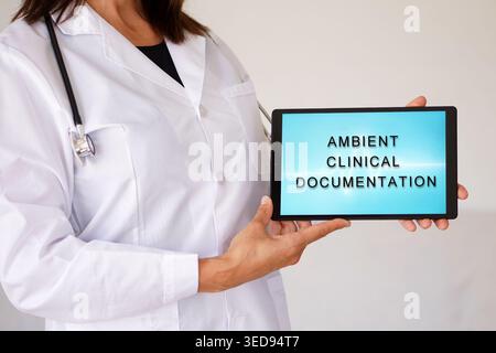 environmental clinical documentation. Healthcare professional showing a digital tablet. Artificial intelligence and medicine concept Stock Photo