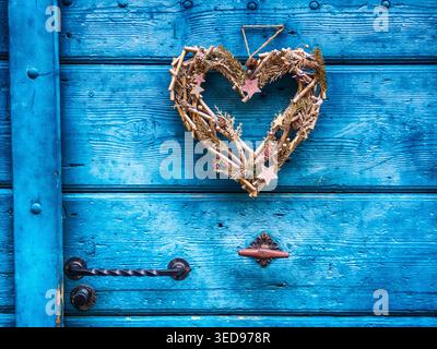 Heart wreath on the door chrismas decoration Stock Photo