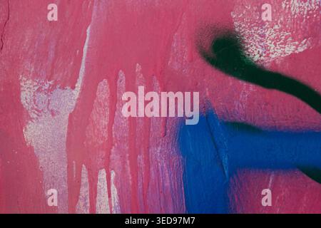 Bright Spray Painted Graffiti on Wall Surface, Abstract Urban Art Background. Stock Photo