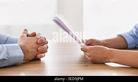 Unrecognizable HR-Manager Talking During Job Interview With Applicant In Office Stock Photo