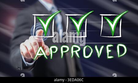 Man touching a validation concept on a touch screen with his fingers Stock Photo