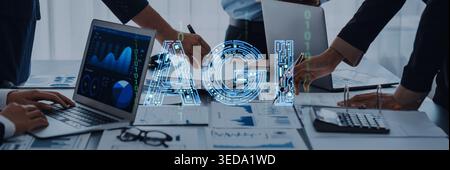 Hands of Business Professionals Collaborating on Data and Technology Analytics with Graphs and Laptops in a Modern Office Setting Haptic. Stock Photo