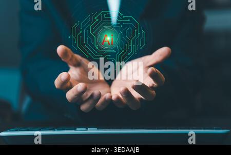 Businessman holding digital circuit brain with AI icon. Concept of artificial intelligence, machine learning, future technology innovation, and neural Stock Photo
