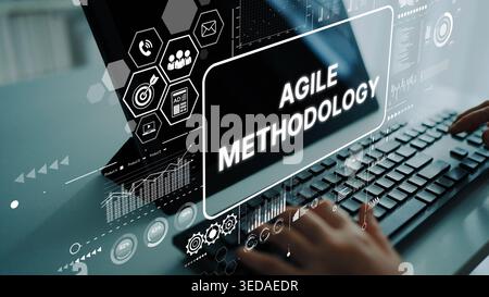 Agile Methodology Concept with Digital Interface and Hands on Keyboard in Modern Office Setting. Asymptotic smart data analytic. Stock Photo