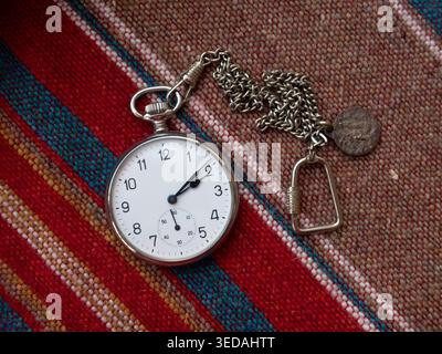 Open face swiss made pocket watch seventeen acier inoxidable Stock Photo