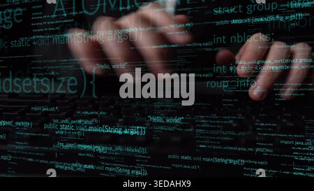 Hands typing on a keyboard are overlaid with computer code, symbolizing the dynamic world of programming and modern software development. Xenic Stock Photo