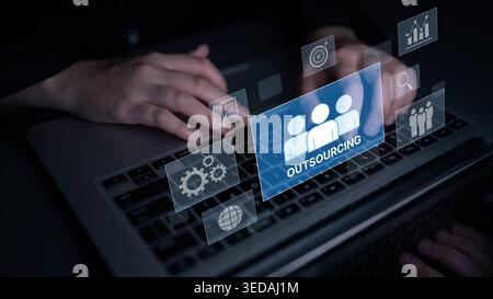 Outsourcing concept showing collaboration, delegation, global workforce, productivity, and task management through remote teams and external service Stock Photo
