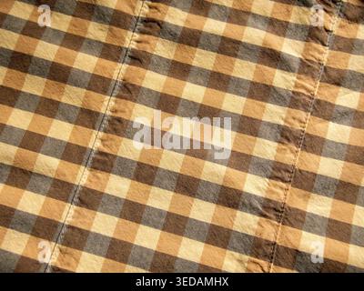 Yellow-gray check fabric background macro Stock Photo