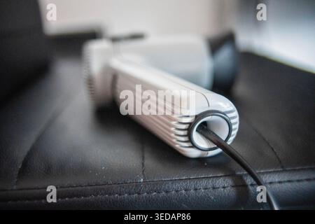 Vintage Hair Dryer on Chair hose und items Stock Photo
