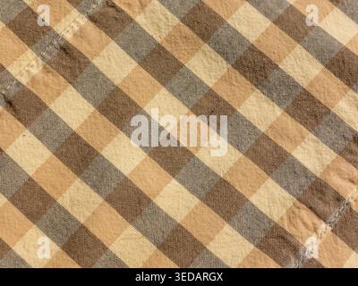 Yellow-gray check textile background macro Stock Photo