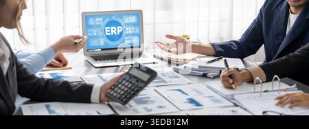 Business intelligence and data analysis concept. Analyst team working on financial data analysis dashboard on laptop screen as marketing indication Stock Photo