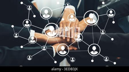 Diverse Business Team Collaborating on Networking Strategy with Digital Connections and Teamwork Concepts for Professional Growth and Success. Amity Stock Photo
