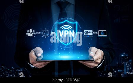 Modern businessman using a digital tablet displaying a VPN shield icon, symbolizing online security and data protection in a digital world Sigmoid Stock Photo