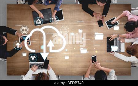 Collaborative Workspace with Digital Devices and Cloud Technology, Representing Modern Communication and Data Sharing in Business Environments Haptic. Stock Photo